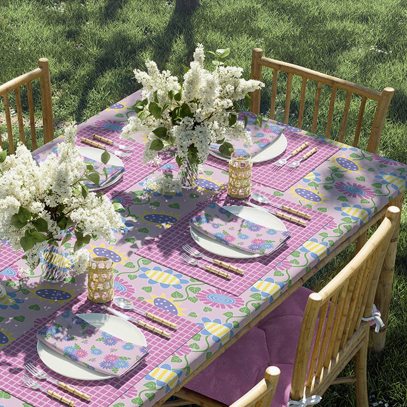 betticlay surface pattern design, Flower Party collection, tablecloth, placement, napkin, and chair cushion in "A Patch of Pink" colorway