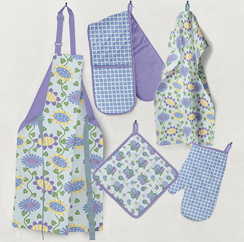 betticlay surface pattern design, Flower Party collection: kitchen apron, potholder, oven mitts and tea towel in "A Patch of Blue" colorway